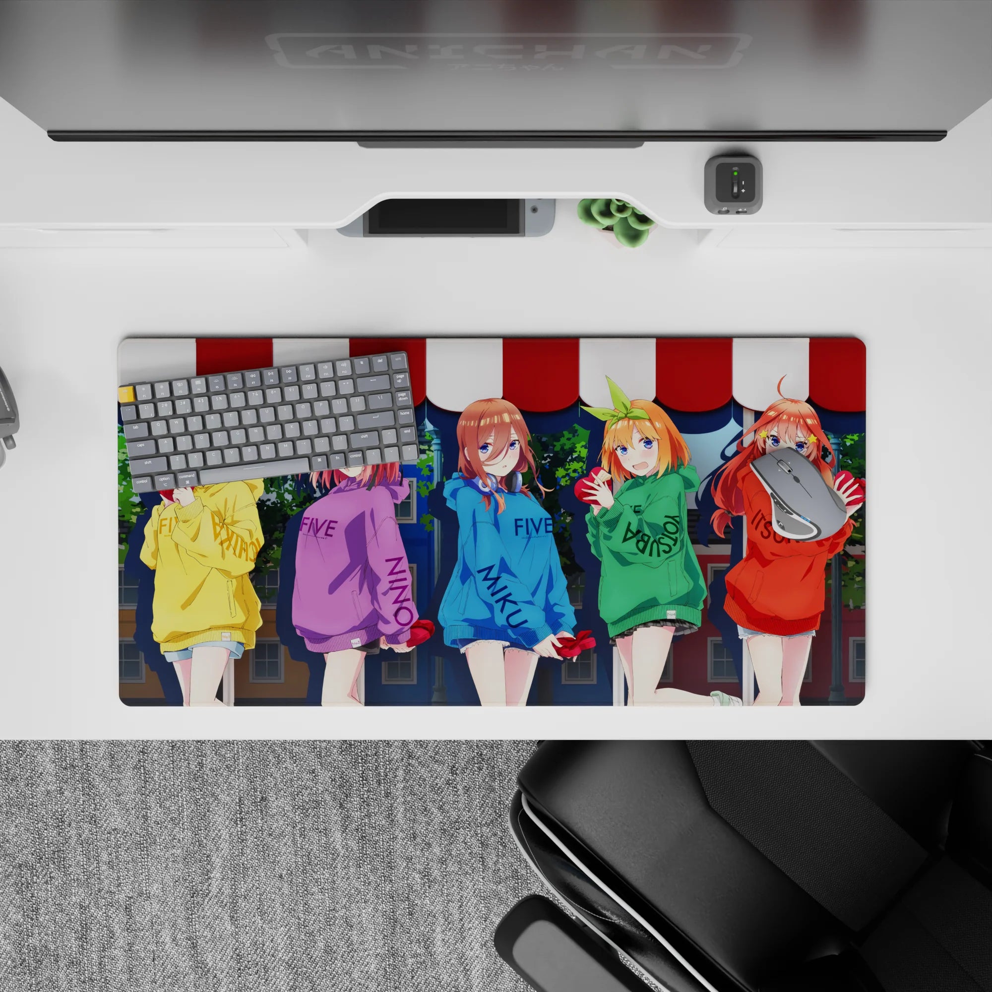 32x16 inches anime desk mat in yellow, purple, blue, green, and red hoodies for a warm, playful vibe.