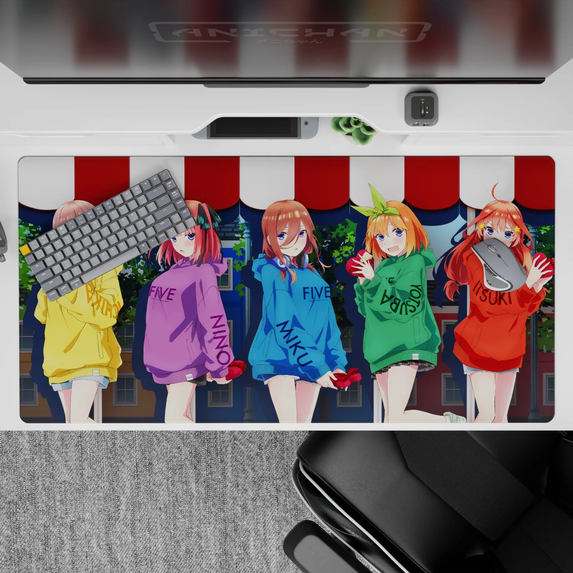 40x20 inches colorful anime desk pad in yellow, purple, blue, green, and red hoodies; warm cute vibe.