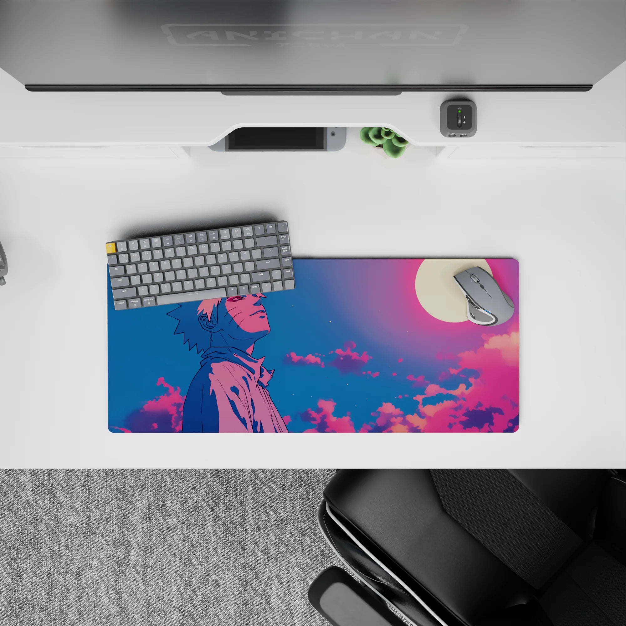 Mouse pad featuring Naruto Uzumaki under a glowing moon with pink, violet, and blue hues, size 28x12 inches.