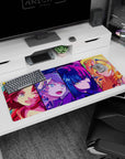 36x16 inches anime desk pad featuring a winking brunette, visor girl, cool blue-bob, and goggled blonde.