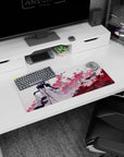 28x12 inches anime girl mouse pad featuring blonde beauty in gloves, petals exploding behind her.