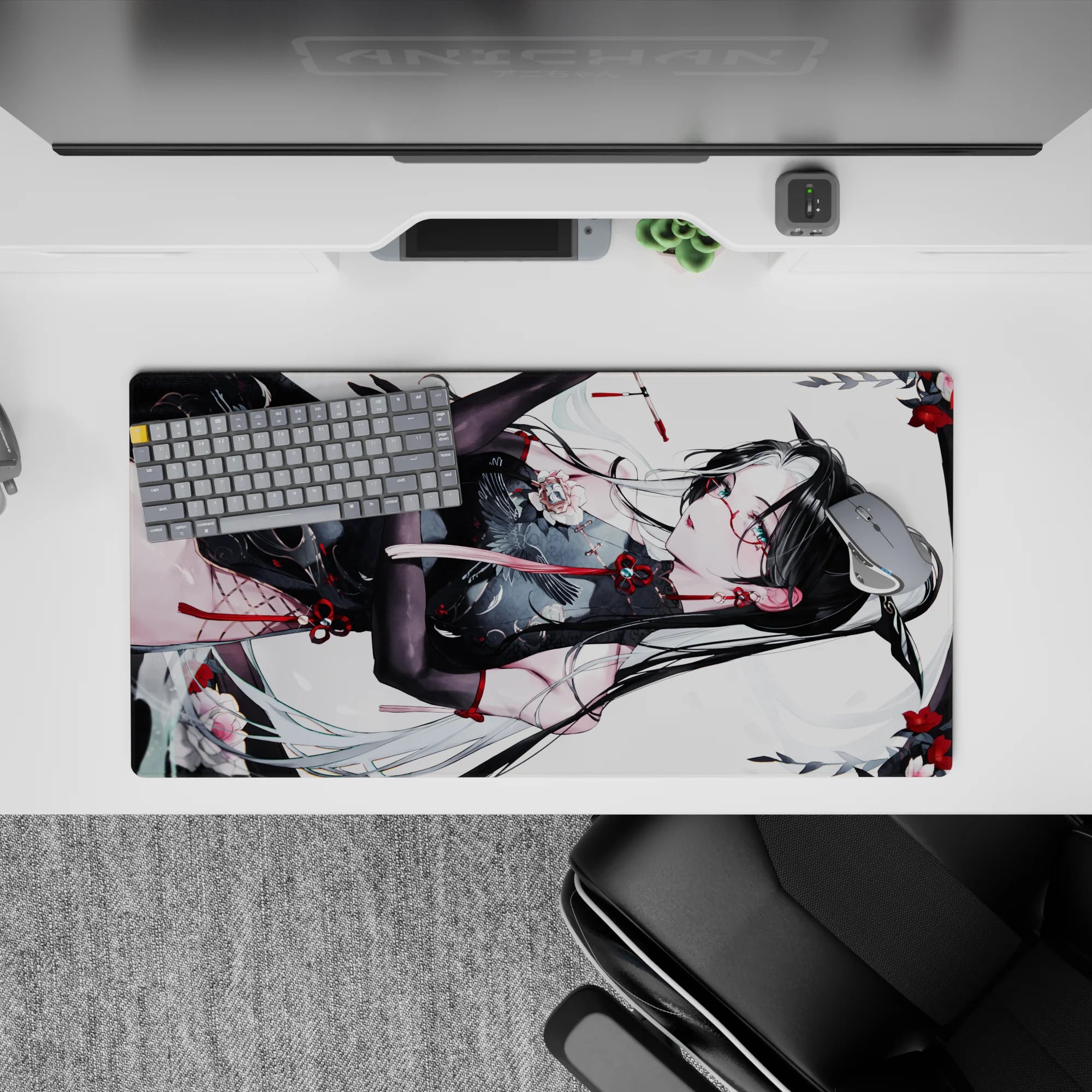 32x16 inches anime girl mouse pad in white, black, and sharp red; cool teasing vibe with drifting pale petals.
