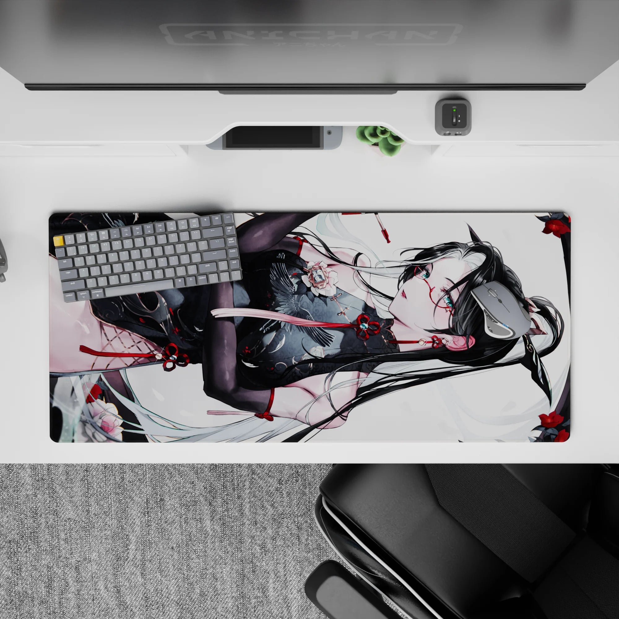 36x16 inches anime desk pad in white, black, and candy-red accents with drifting petals and cool vibe.