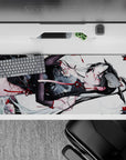 36x16 inches anime desk pad in white, black, and candy-red accents with drifting petals and cool vibe.