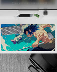 Inosuke Hashibira from Demon Slayer charges with blades drawn; anime mouse pad 32x16 inches, vibrant and dynamic.