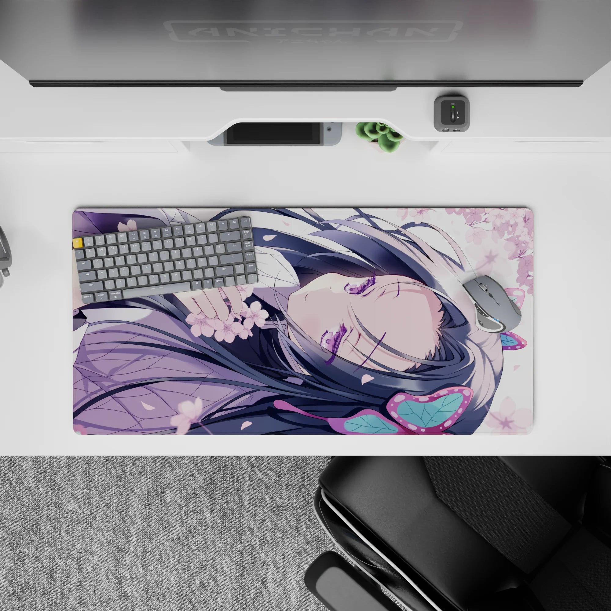 Dreamy pastel anime desk mat 32x16 inches in pale lavender, pink blossoms, teal accents, cozy vibe.