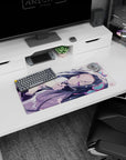 Flirty anime girl curled on her side on a 28x12 inches mouse pad, blossoms on sleeves and fingers.