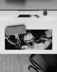 28x12 inches monochrome horror-cute anime mouse pad, pale girl in deep black smoke shadows, bold linework.