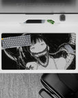 Ink-black and pale horror-cute anime girl mouse pad 32x16 inches, spooky romance vibe, clean bold style.