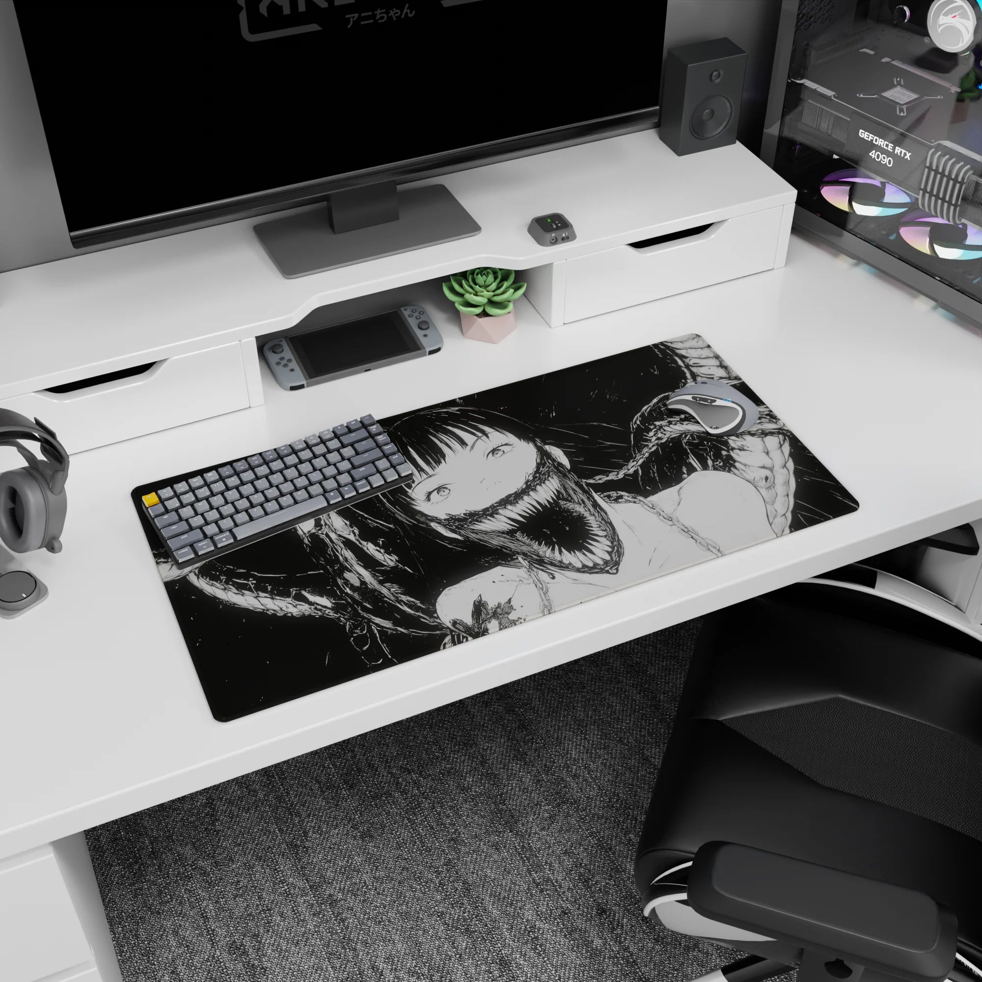 Wide-eyed anime girl with sharp-toothed grin and smoky ribbon shadows on a 32x16 inches desk mouse pad.