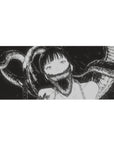 36x16 inches anime girl desk pad with ink-black shadow tendrils and sharp-toothed grin line art.