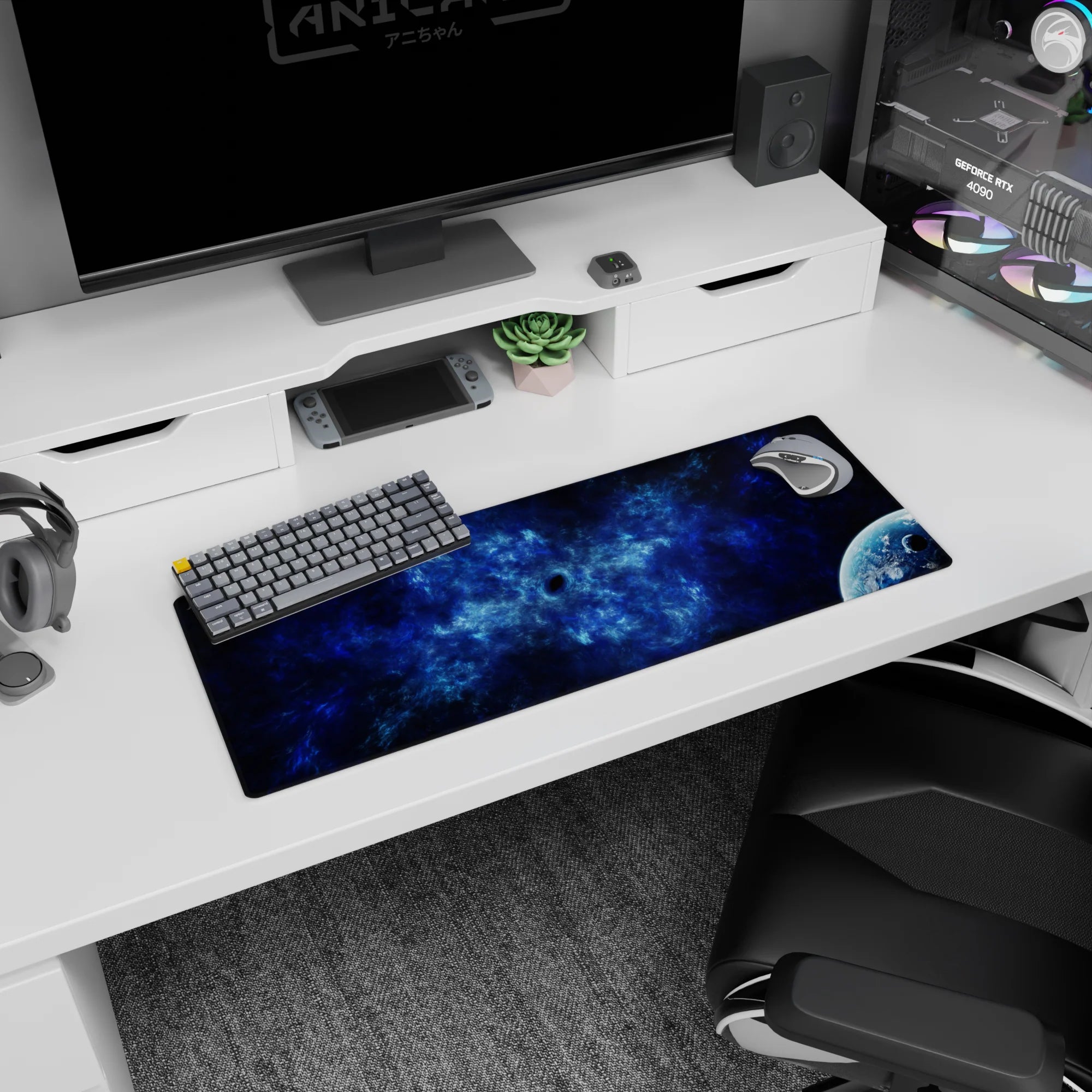 Tiny dark void and distant planet scene mouse pad 32x12 inches with swirling nebula clouds in deep blues.