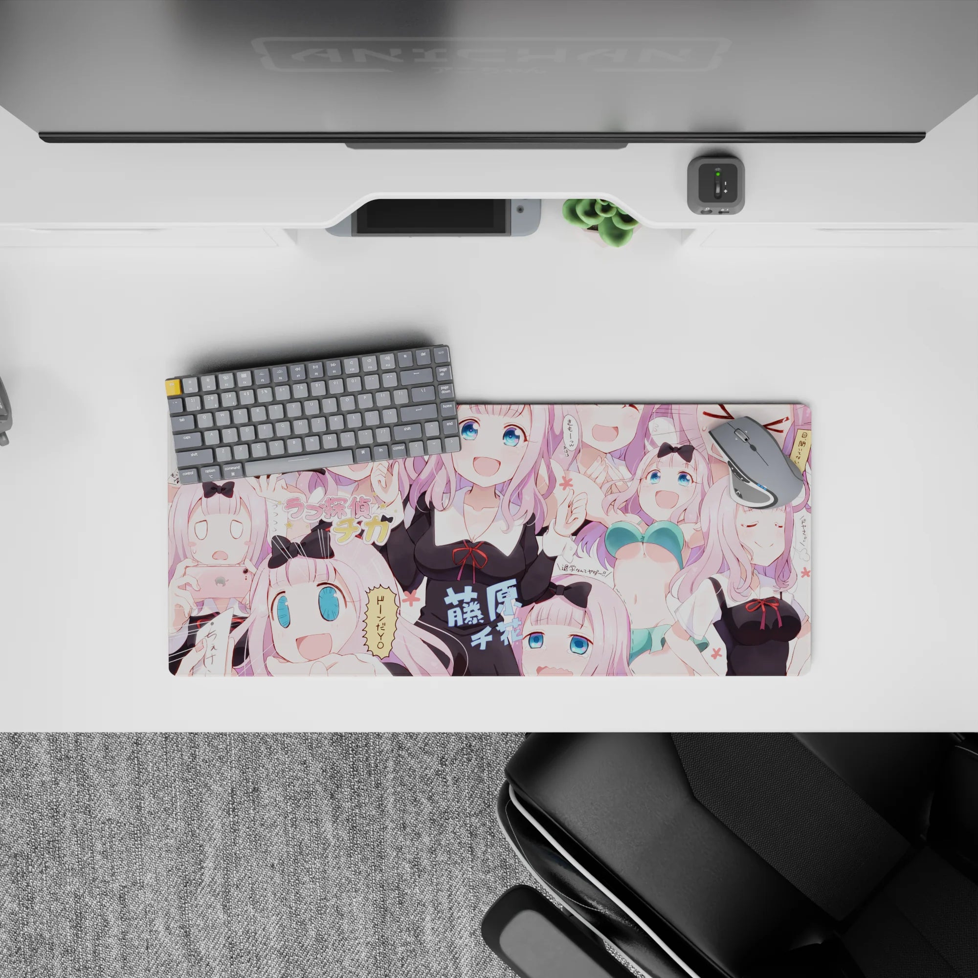 28x12 inches pastel pink desk mouse pad with blush background, candy hair tones, and playful chaotic vibes.