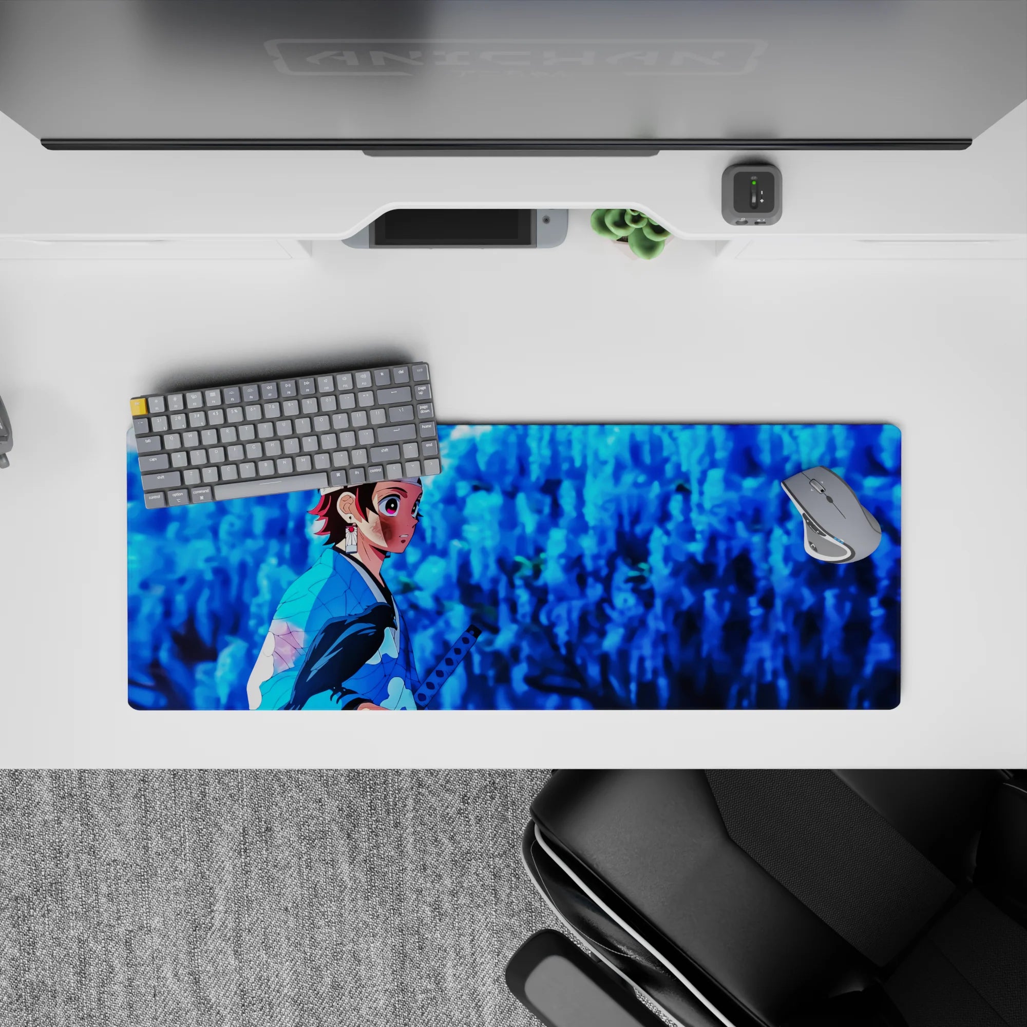 Tanjiro Kamado Demon Slayer anime mouse pad, 32x12 inches, featuring his determined look amidst glowing wisteria petals.