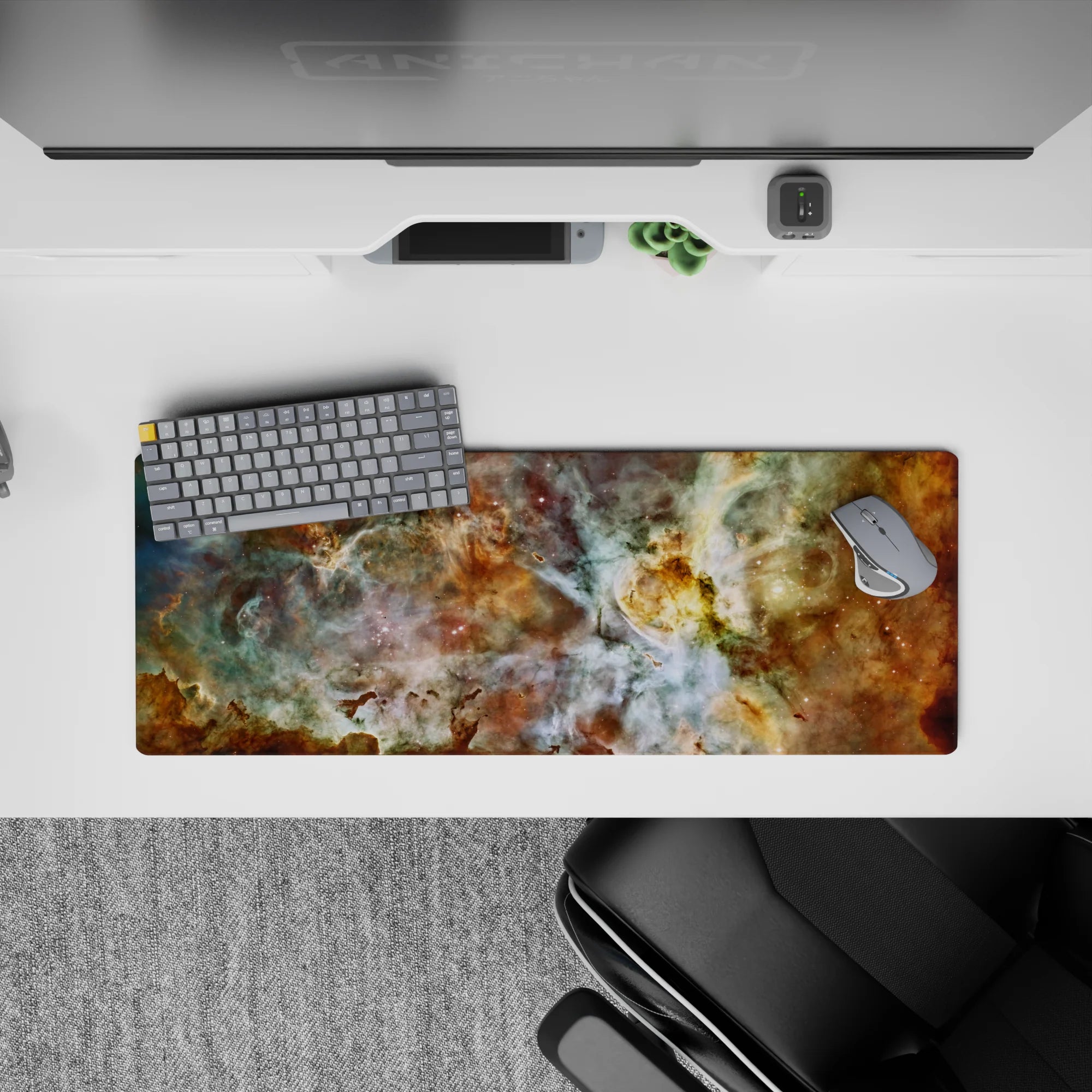 Cosmic nebula desk mouse pad 32x12 inches with teal, gold, and white swirls for stylish workspace decor.