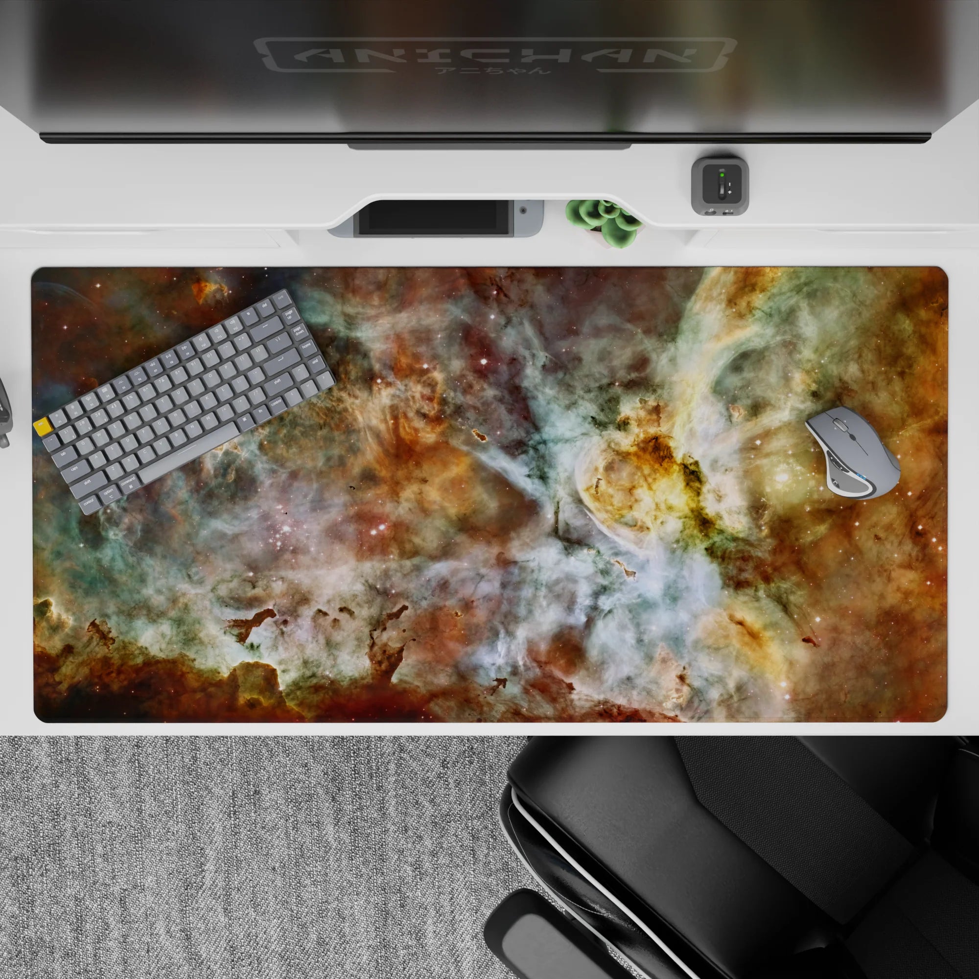 Cosmic desk pad 40x20 inches with teal, gold, and white nebula design adding calm, elegant style to workspace.