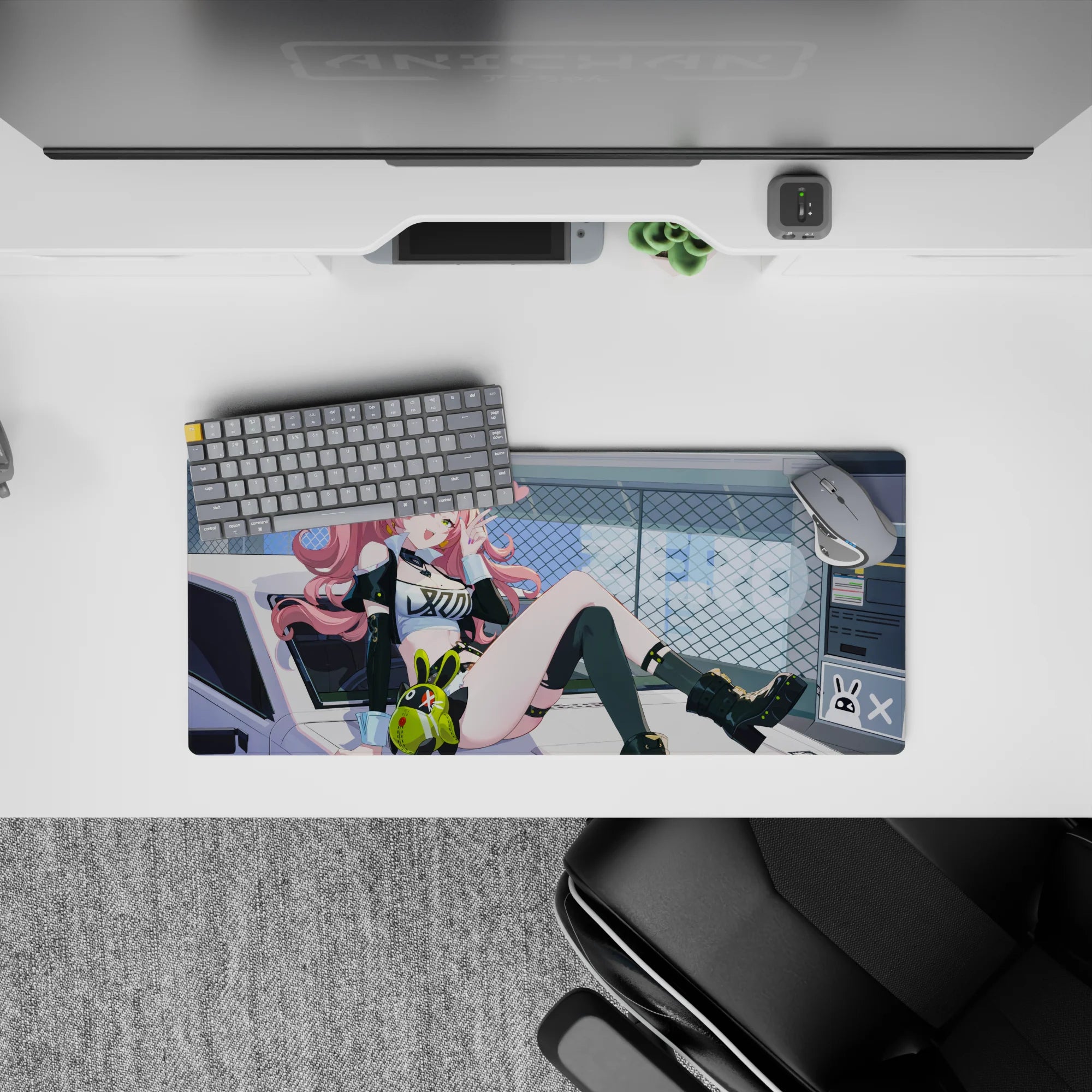 Neon-lime and candy-pink anime mouse pad 28x12 inches, sweet-meets-edgy vibe with tech stickers.
