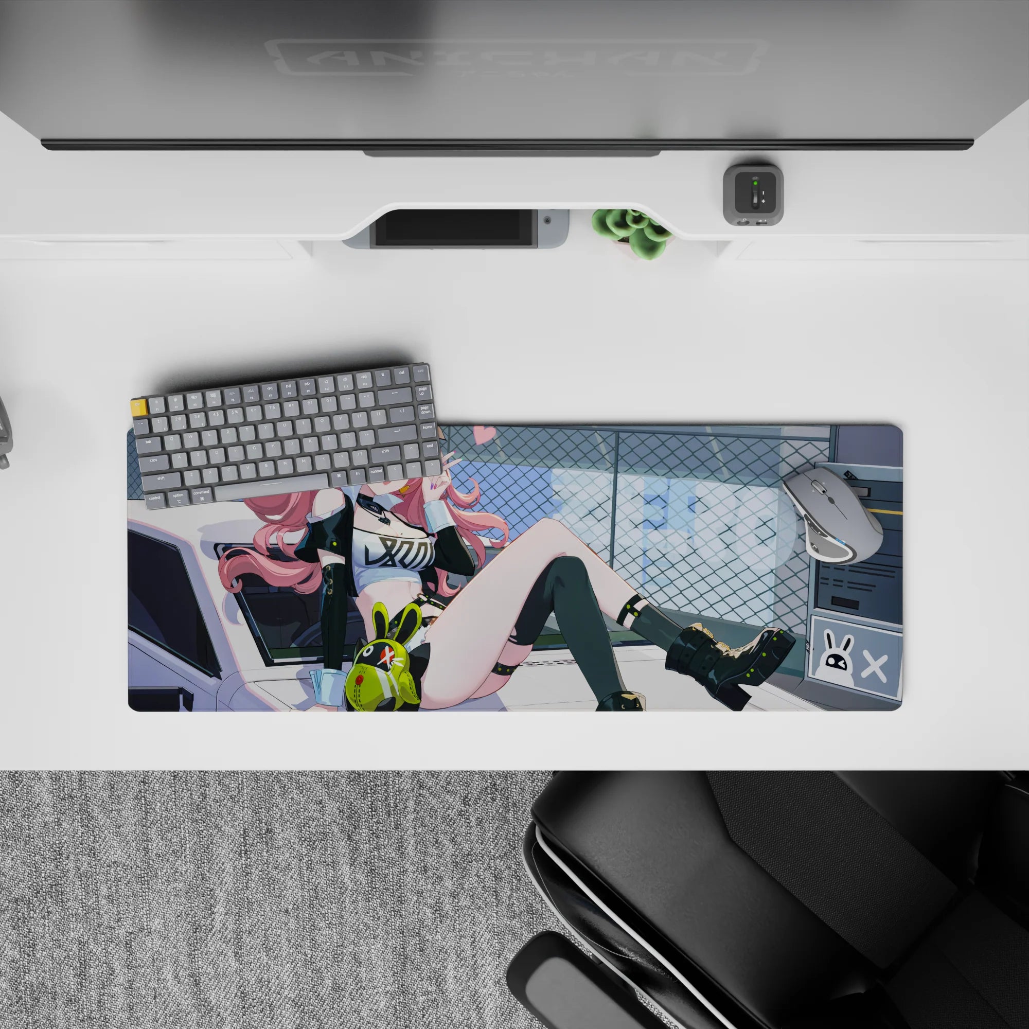 Neon-lime and candy-pink anime girl mouse pad 32x12 inches, edgy street-cute vibe with tech stickers.