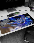 40x20 inches anime girl mouse pad showing a wind-swept mage with streaming blue hair and glowing paint ribbons.