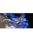 Anime girl desk pad 36x16 inches with icy magic art, flowing hair, neon paint-splash ribbons.