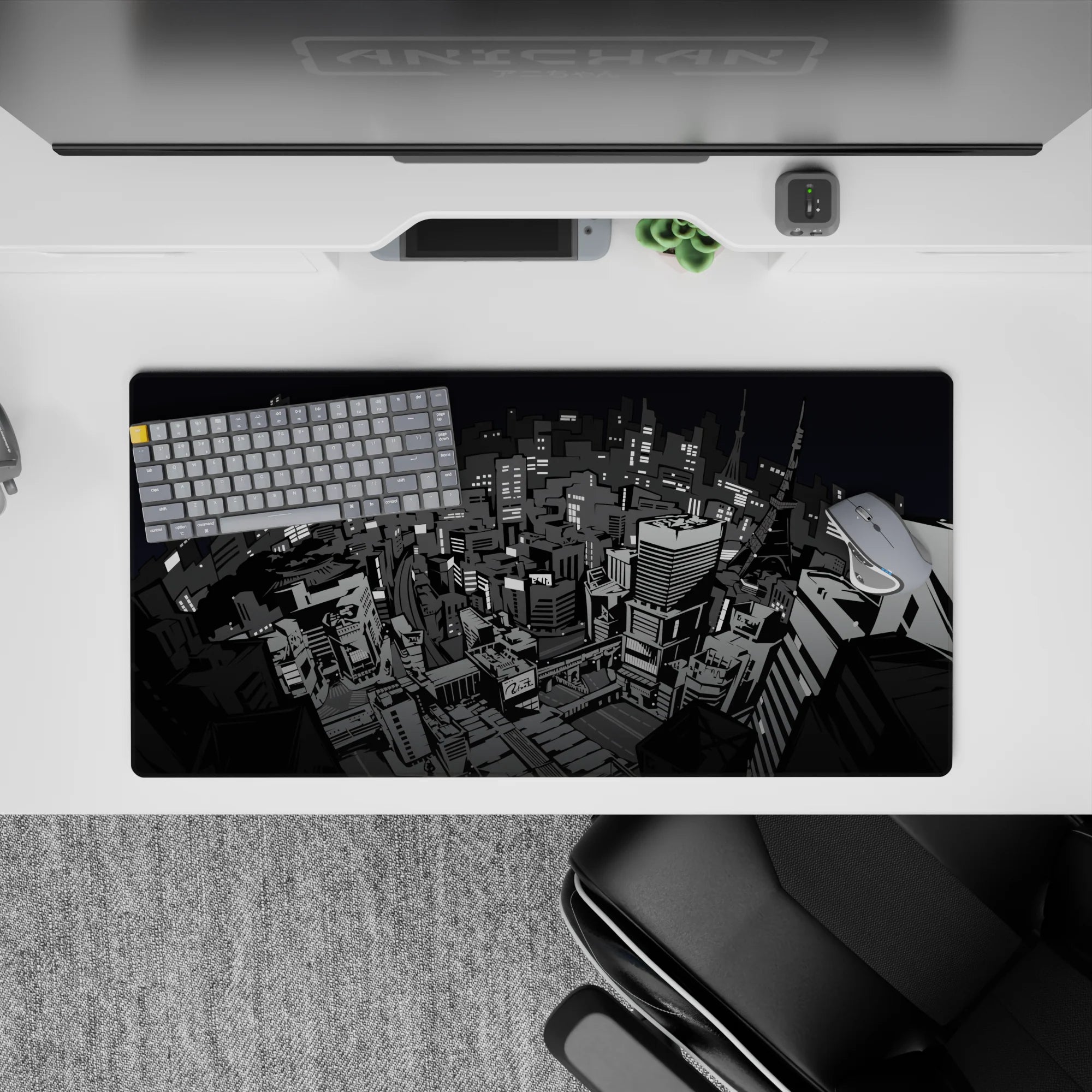Persona 5 mouse pad featuring grayscale Tokyo cityscape, 32x16 inches. Perfect for anime fans and urban noir enthusiasts.