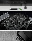 Persona 5 anime desk pad, 40x20 inches, featuring a stylized Tokyo cityscape in gritty grayscale, perfect for fans.