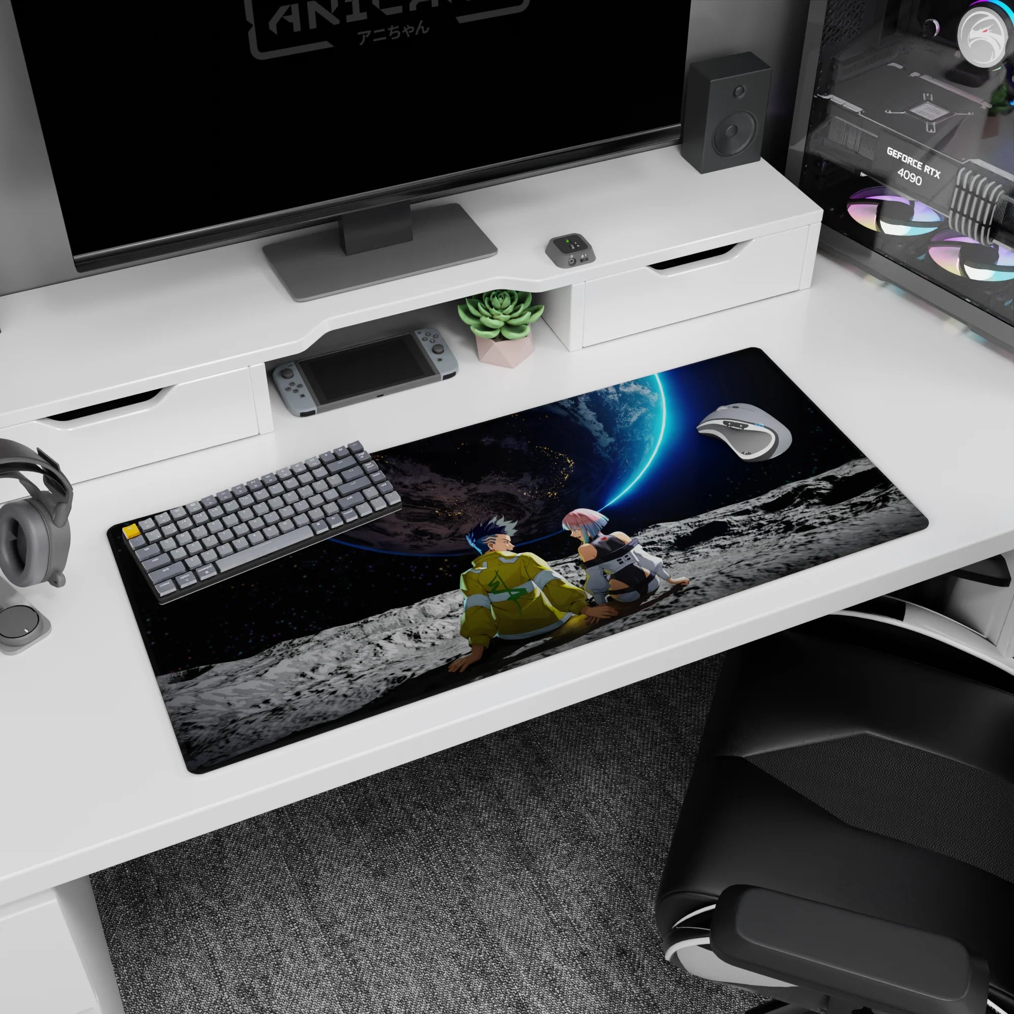 36x16 inches anime desk pad showing spiky-haired boy and pink-bob girl on the moon under a huge planet.