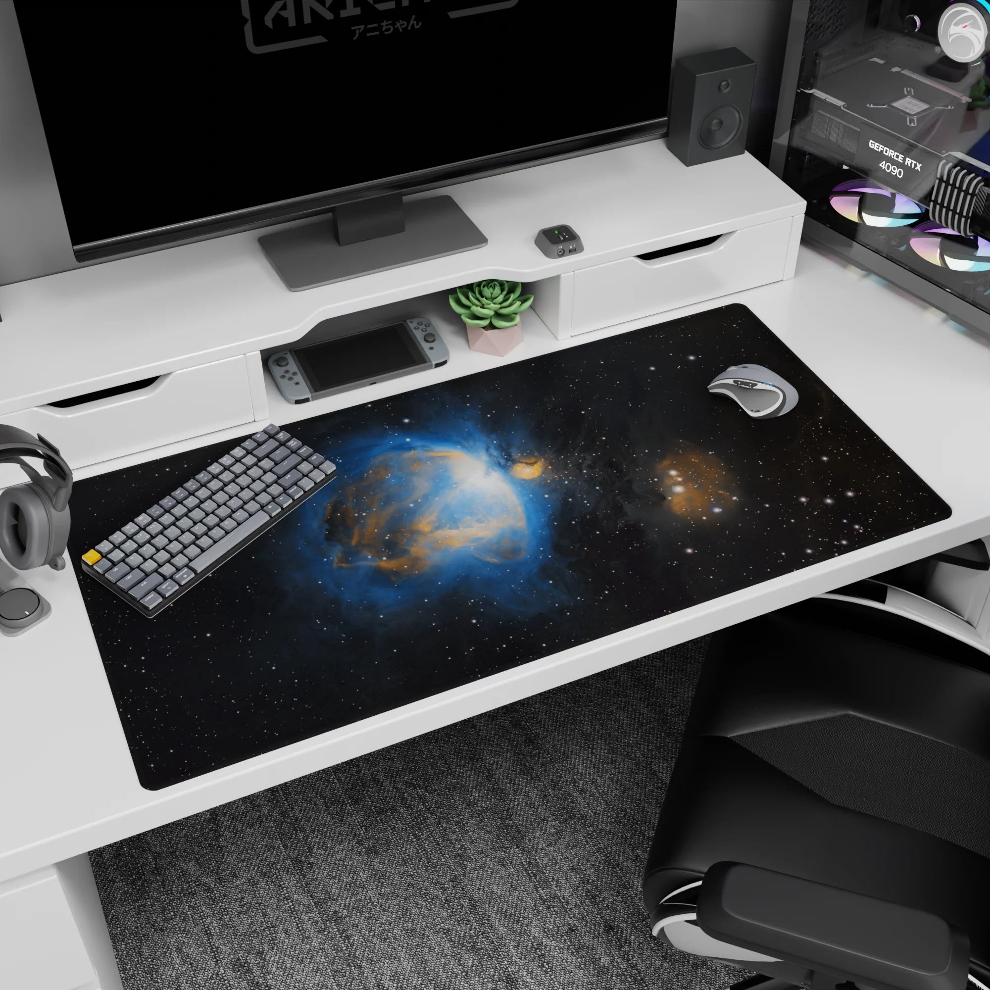 Galaxy-themed desk pad with deep space black and smoky blue nebula design, 40x20 inches.