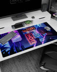 Silver-haired anime girl leaning close with her cat under bright signs, desk pad 40x20 inches.