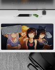 32x16 inches anime girl desk mat in cozy dark tones, with silver, blonde, and brown-black hair and a red heart wink.