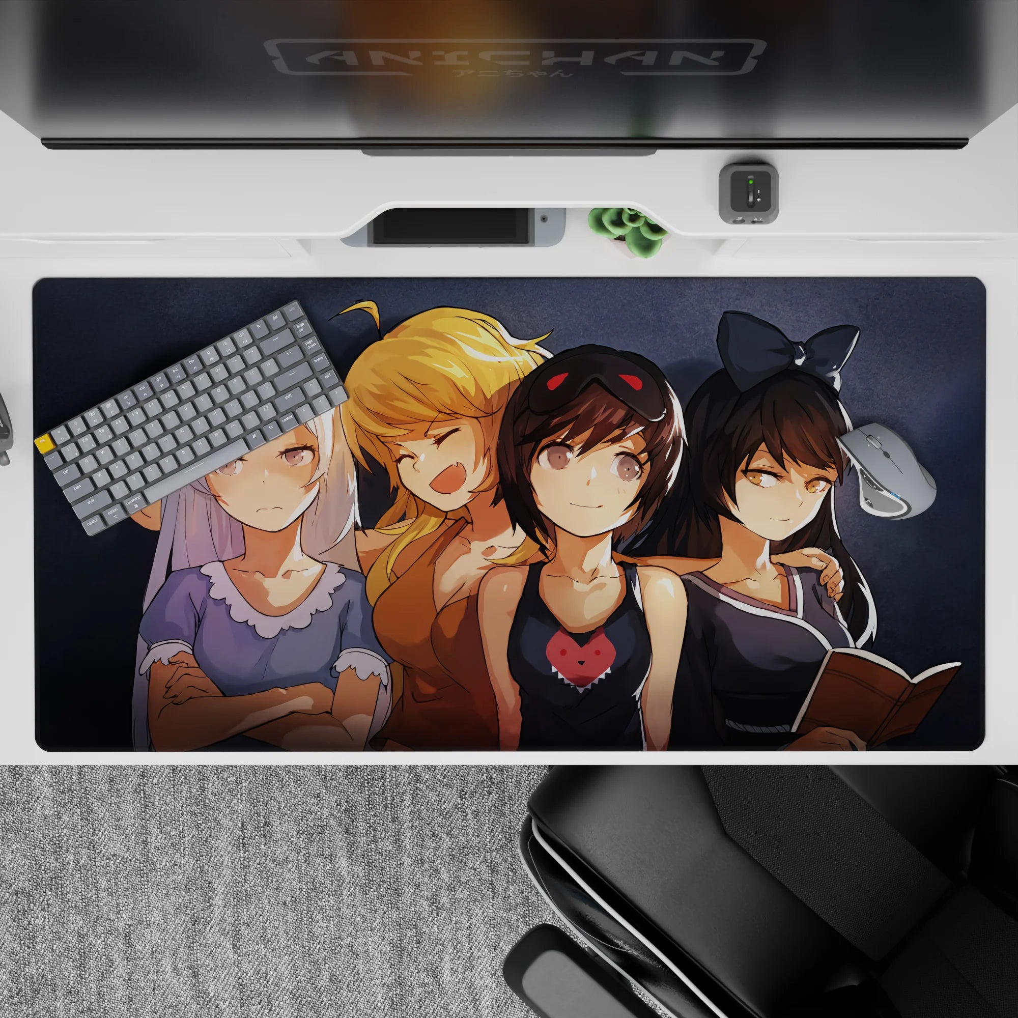 40x20 inches anime desk pad in dark gray with silver, blonde, and brunette hair tones and a red heart wink.