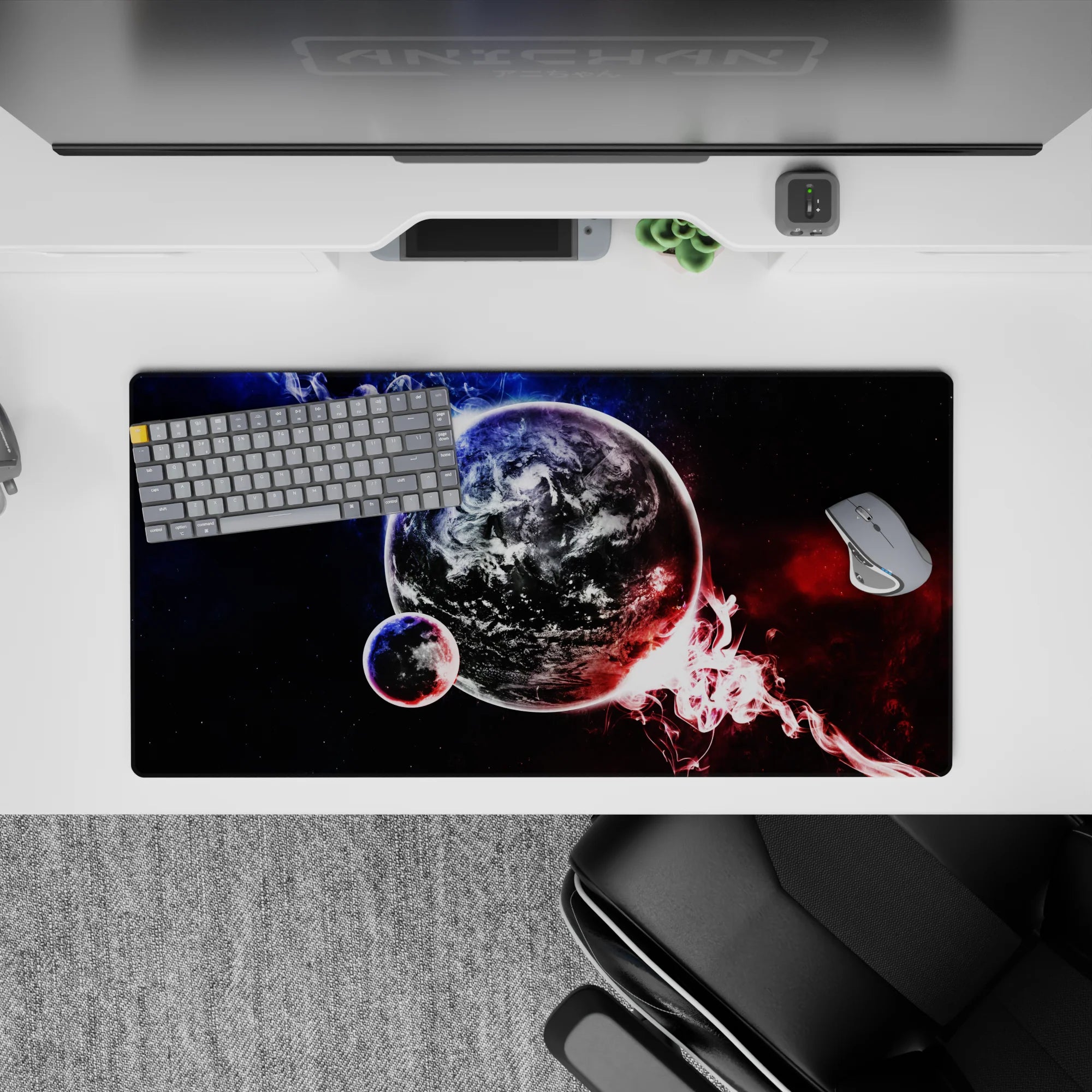Moody cosmic mouse pad 32x16 inches in deep black with icy blue glow and fiery red nebula contrast.