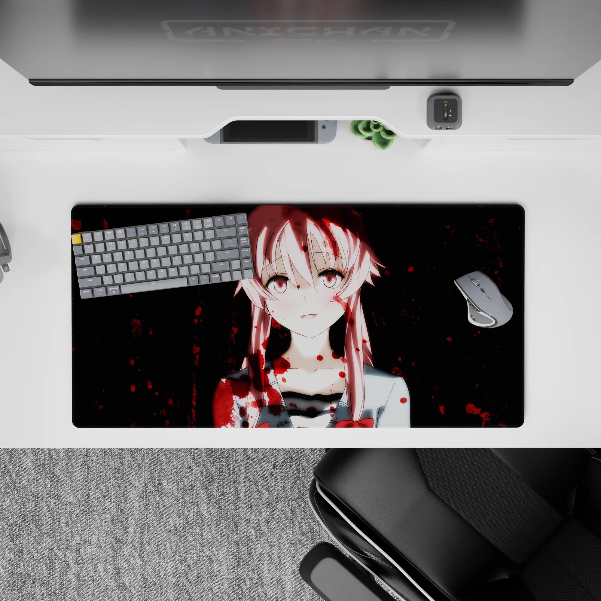 Cute-chaotic 32x16 inches desk mat in pale pink and midnight tones with bold crimson splatter.