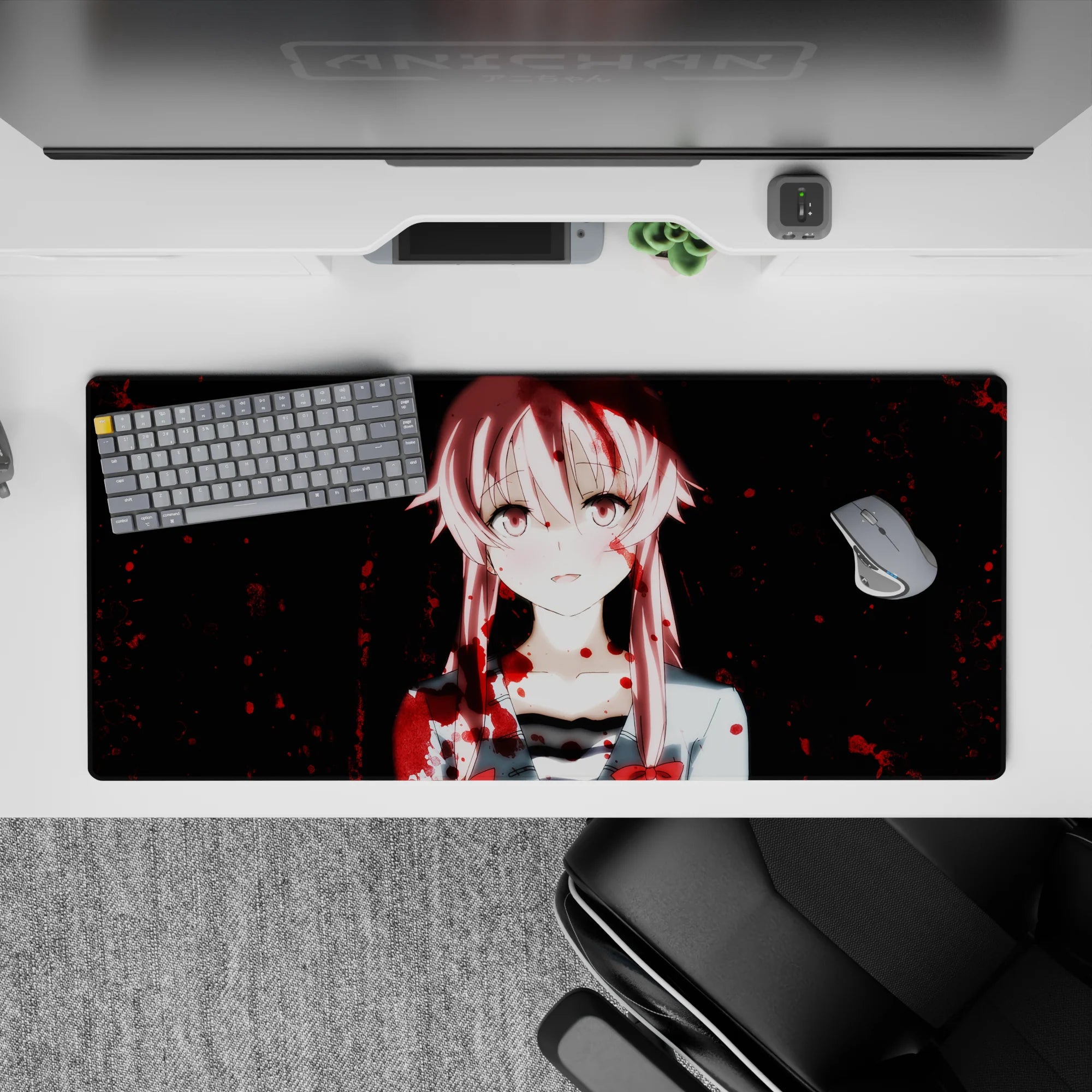 36x16 inches desk pad in midnight tones with pale pink hair and bold red splatter, cute-chaotic mood.