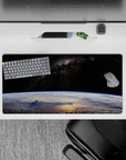 Velvet-black cosmic mouse pad 32x16 inches in cool blues and cloud whites, calm and epic mood.