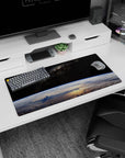 Earth from space mouse pad 32x16 inches featuring glowing blue planet curve beneath tiny stars.
