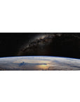 Space galaxy desk pad 36x16 inches with starry sky, dusty nebula band, and Earth horizon curve.