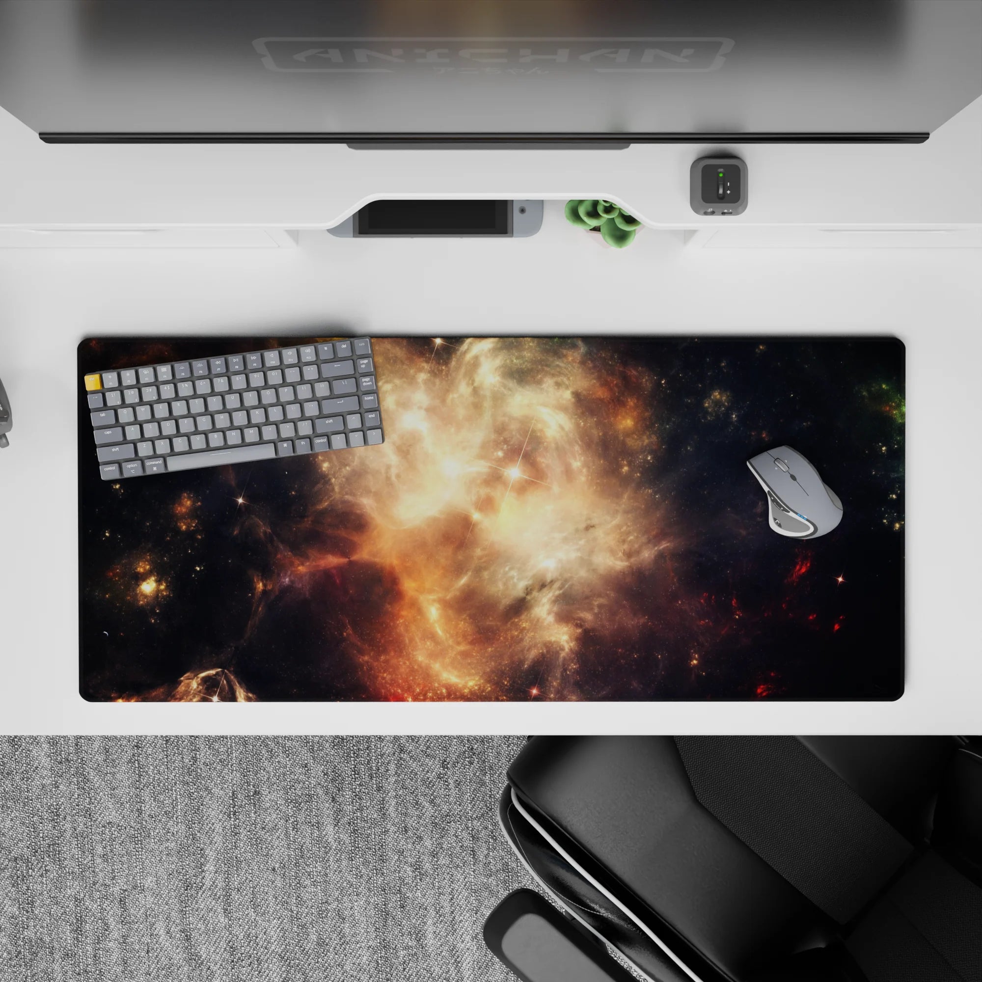 Moody 36x16 inches desk pad in smoky black with warm amber sparks and honey-gold glow, cosmic vibe.