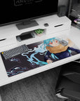 36x16 inches anime desk pad featuring a poised aqua-haired girl in dark uniform jacket and fluffy tan scarf.