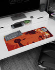 32x12 inches anime mouse pad showing a blond hero tumbling, flame-like hair, scarf and armor, sword ready.