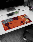 32x16 inches anime mouse pad showing a blond scarfed hero midair, sword ready over ruined pillars.