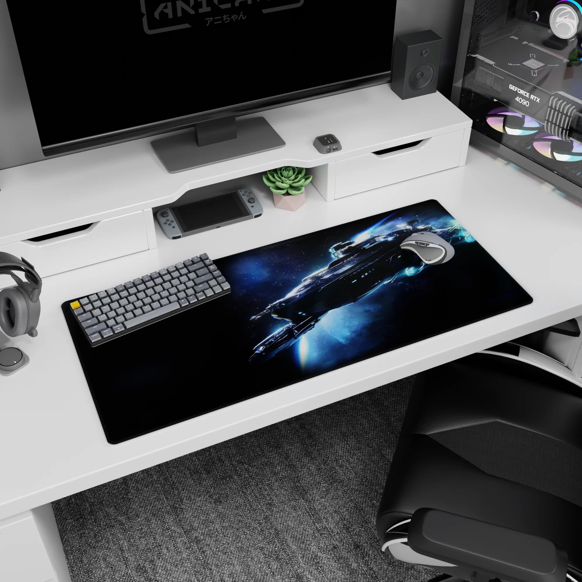 Starship cutting through a blue trail on desk pad 36x16 inches, with tiny stars in deep space.