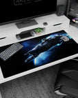 Sleek starship cutting through a glowing blue trail on a 40x20 inches desk pad, set in deep space.