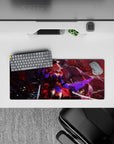 28x12 inches extended mouse pad in deep crimson fog and shadow, with electric violet accents and falling flecks.