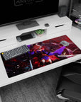 36x16 inches extended mouse pad showing a pink-haired blade dancer in red haze, petals/ash drifting around.