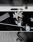 40x20 inches dark anime desk pad in deep blacks and smoky grays with electric blue Karma glow accents.