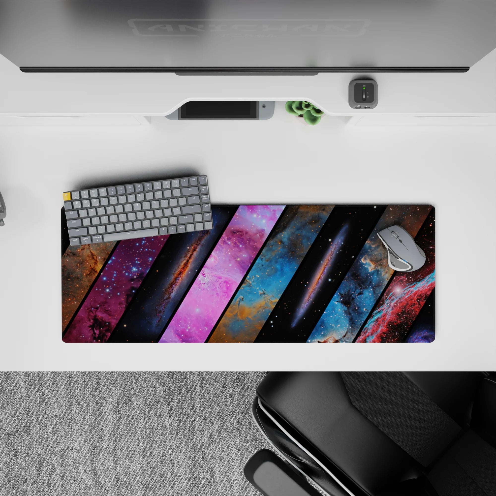 Midnight black, dreamy blues, and hot pink nebula mood mouse pad, 32x12 inches, calm cosmic vibe.