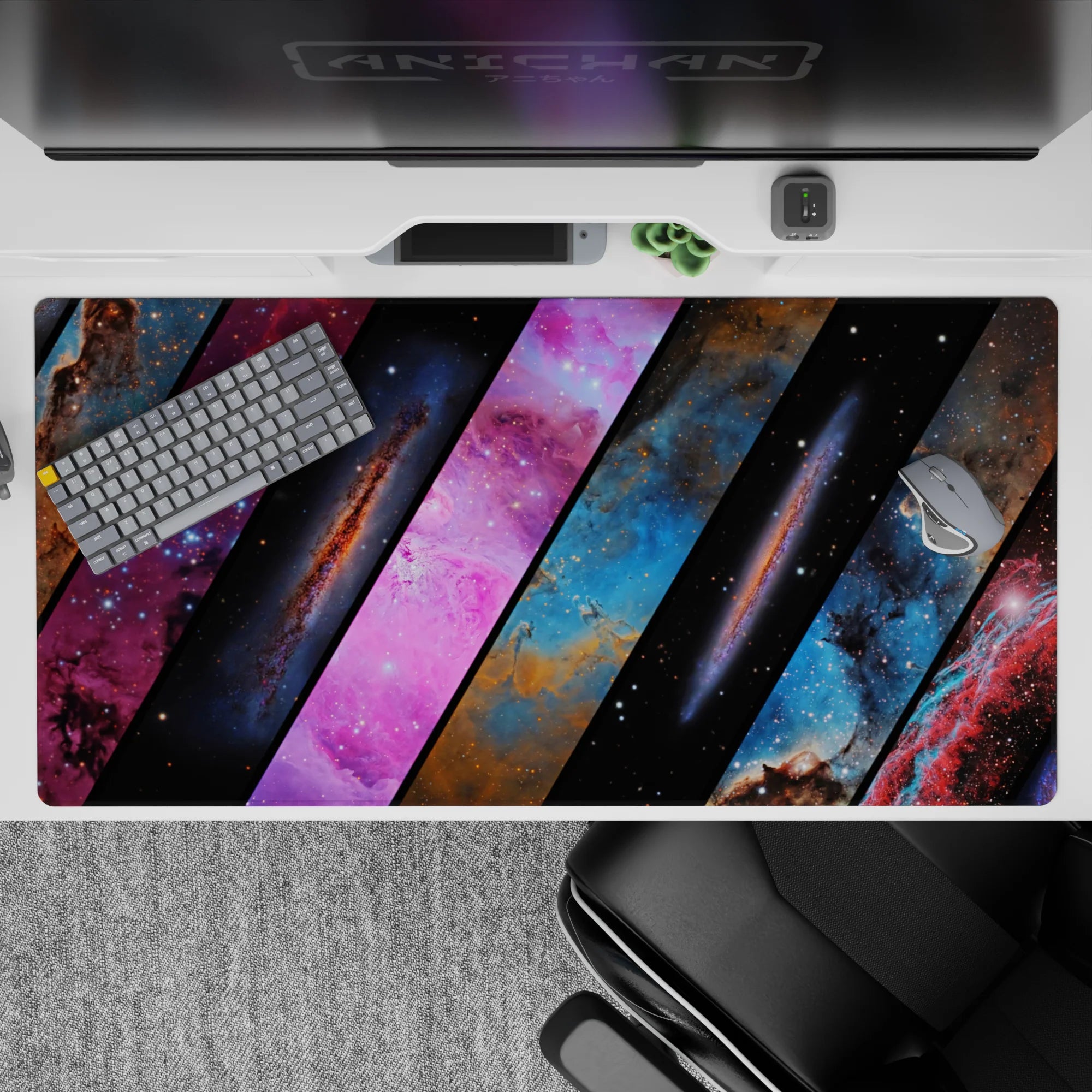 Midnight black desk pad, 40x20 inches, with dreamy blues and hot pink nebula vibes.