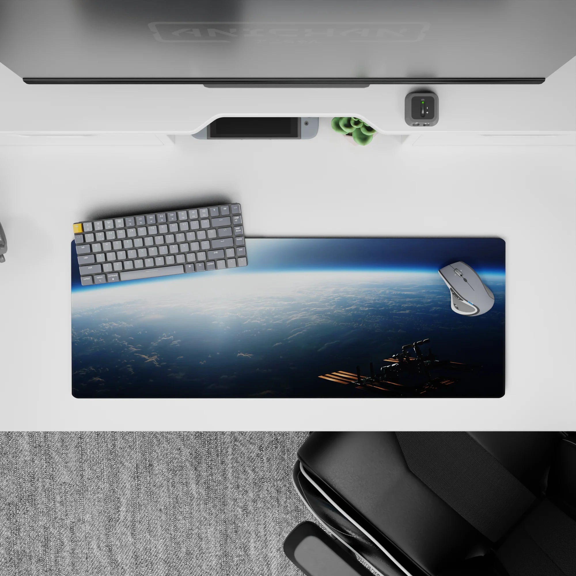 Moody navy and icy blue sunrise glow desk mouse pad, 32x12 inches, quiet cinematic vibe.