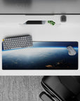 Moody navy and icy blue sunrise glow desk mouse pad, 32x12 inches, quiet cinematic vibe.